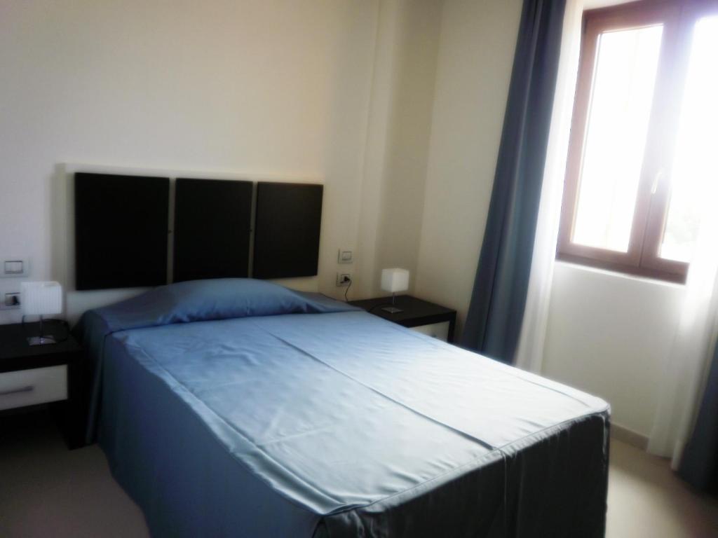 Buddi Hotel Platamona Cameră foto