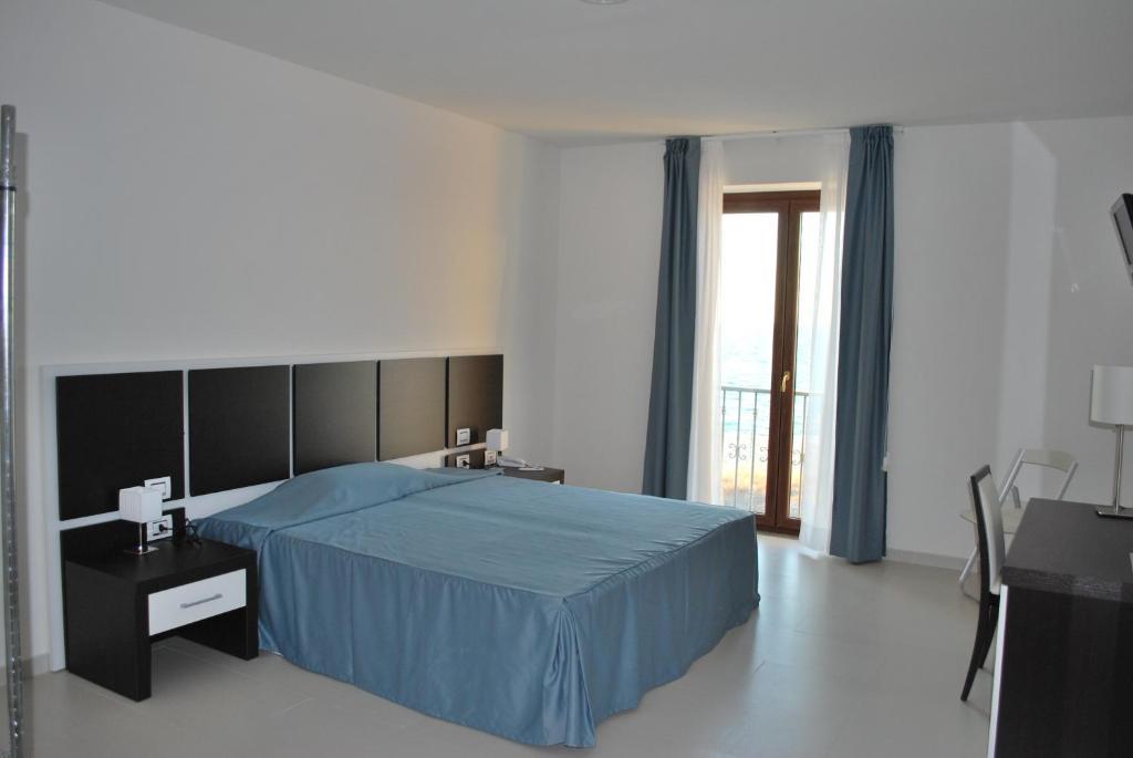 Buddi Hotel Platamona Cameră foto