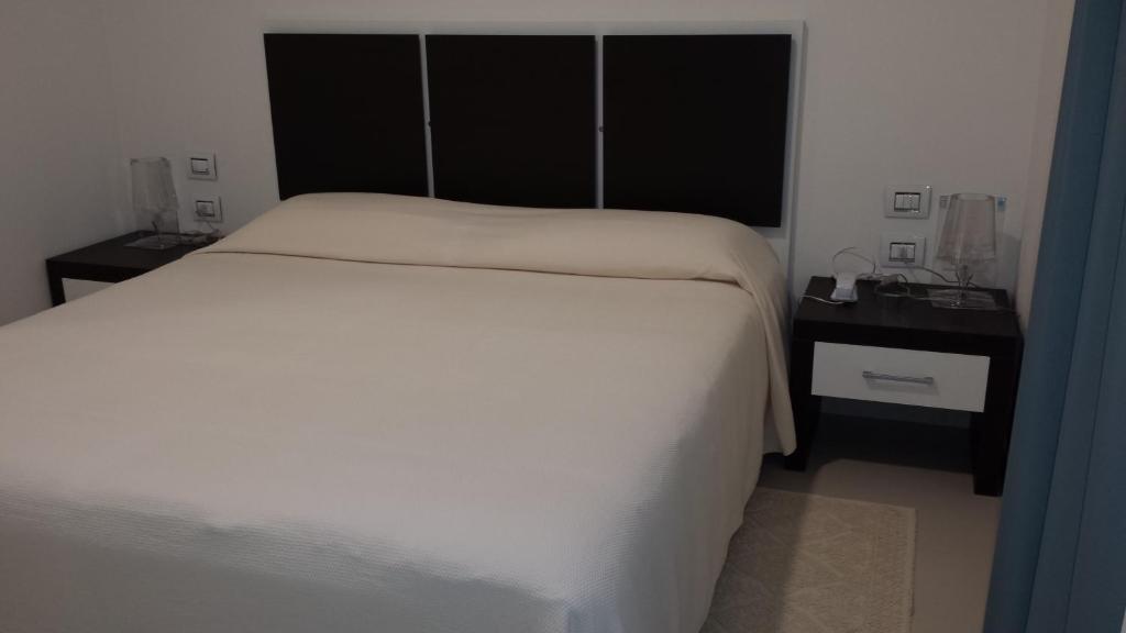 Buddi Hotel Platamona Cameră foto
